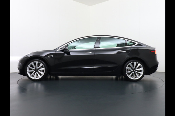 Tesla Model 3 RWD SR+ 60kWh 325PK Trekhaak Lmv 19" AutoPilot FSD-3 Comp. Premium Luidsprekers Leder PanoDak Adaptive-Cruise Camera's Elektr.-S Navi LED Comfortstoelen ACC DAB Voorverwarmen interieur en Keyless via App One-Pedal-Drive Origineel Nederlandse auto tot 11kw laden thuis! Garantie Accu tot 05-12-2027 max 160.000km 1.584kg licht! 1.000kg trekvermogen