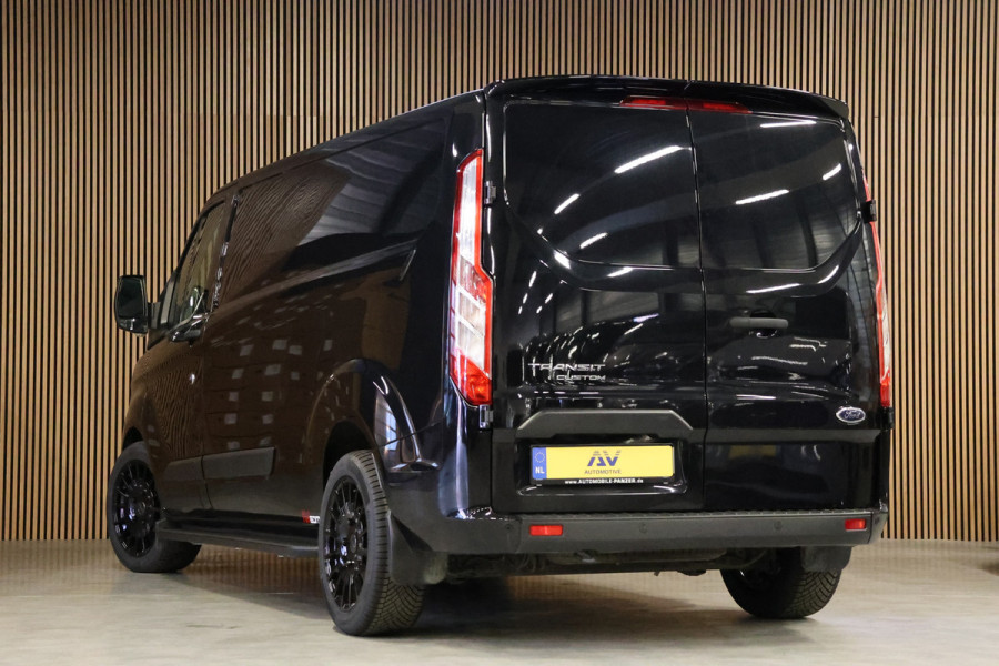 Ford Transit Custom 300 2.0 TDCI L2H1 Raptor Edition | 6.500 KM | BPM VRIJ | CarPlay | Lane Assist | DAB | Cruise control | PDC V+A | 3-Zitter | Betimmering | Nieuwe APK | Fabrieksgarantie