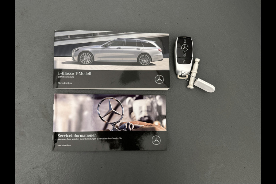 Mercedes-Benz E-Klasse Estate 300 e AMG Line | Panoramadak | Multispaaks lichtmetalen velgen | MBUX wide screen | Navigatie | Parking support | Inclusief 24 maanden MB Certified garantie voor Europa.