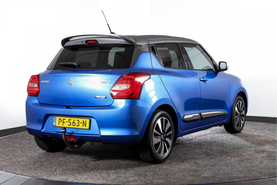 Suzuki Swift 1.0 Stijl 115 PK Smart Hybrid | Adapt. Cruise |Stoelverw. | Camera | NAV + App. Connect | ECC | Afn. Trekhaak | LM 16" |