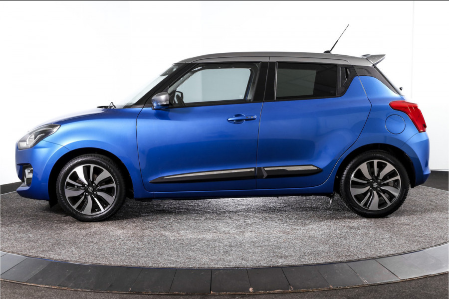 Suzuki Swift 1.0 Stijl 115 PK Smart Hybrid | Adapt. Cruise |Stoelverw. | Camera | NAV + App. Connect | ECC | Afn. Trekhaak | LM 16" |