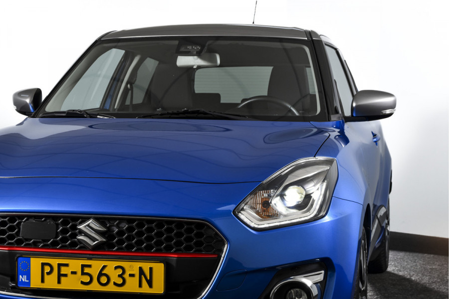 Suzuki Swift 1.0 Stijl 115 PK Smart Hybrid | Adapt. Cruise |Stoelverw. | Camera | NAV + App. Connect | ECC | Afn. Trekhaak | LM 16" |