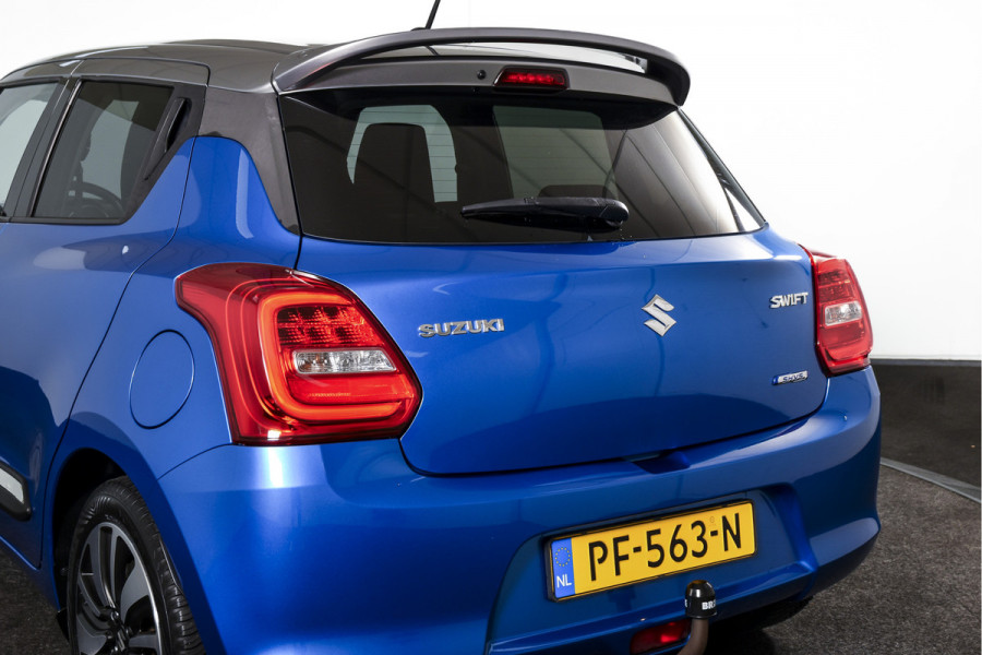 Suzuki Swift 1.0 Stijl 115 PK Smart Hybrid | Adapt. Cruise |Stoelverw. | Camera | NAV + App. Connect | ECC | Afn. Trekhaak | LM 16" |