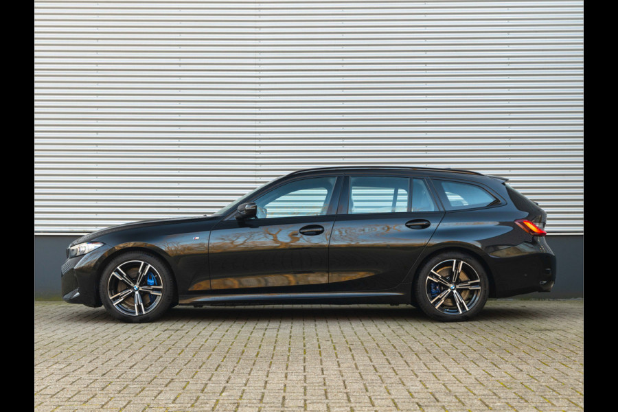 BMW 3 Serie Touring 330i M-Sport - Trekhaak - ACC - Hifi - Camera - M Sport Remmen Blauw