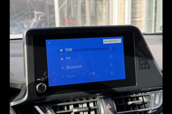 Toyota C-HR 1.8 Hybrid Bi-Tone | Dodehoekherkenning, Stoel + Stuurverwarming, Parkeersensoren, 18 inch, Keyless, Nieuwe multimedia