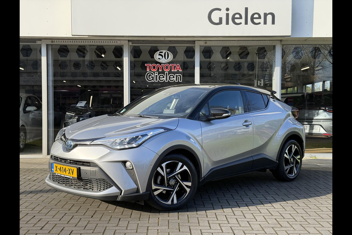 Toyota C-HR 1.8 Hybrid Bi-Tone | Dodehoekherkenning, Stoel + Stuurverwarming, Parkeersensoren, 18 inch, Keyless, Nieuwe multimedia Toyota C-HR 1.8 Hybrid Bi-Tone | Dodehoekherkenning, Stoel + Stuurverwarming, Parkeersensoren, 18 inch, Keyless, Nieuwe multimedia
