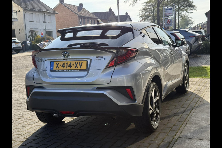 Toyota C-HR 1.8 Hybrid Bi-Tone | Dodehoekherkenning, Stoel + Stuurverwarming, Parkeersensoren, 18 inch, Keyless, Nieuwe multimedia