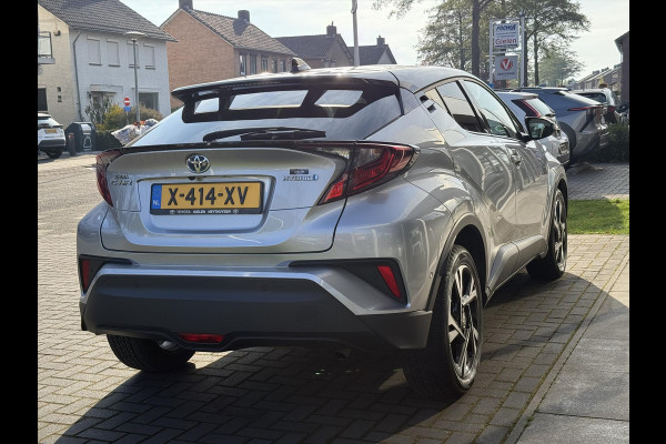 Toyota C-HR 1.8 Hybrid Bi-Tone | Dodehoekherkenning, Stoel + Stuurverwarming, Parkeersensoren, 18 inch, Keyless, Nieuwe multimedia