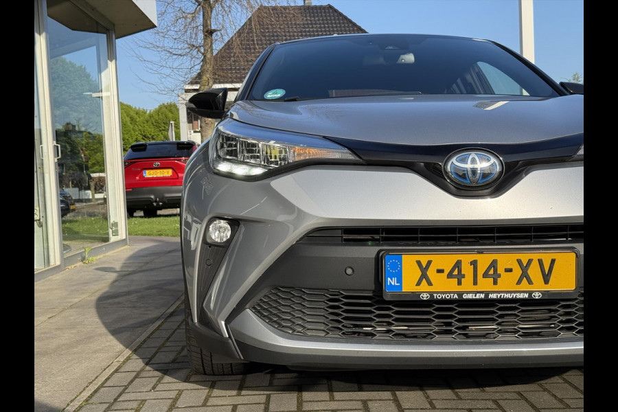 Toyota C-HR 1.8 Hybrid Bi-Tone | Dodehoekherkenning, Stoel + Stuurverwarming, Parkeersensoren, 18 inch, Keyless, Nieuwe multimedia