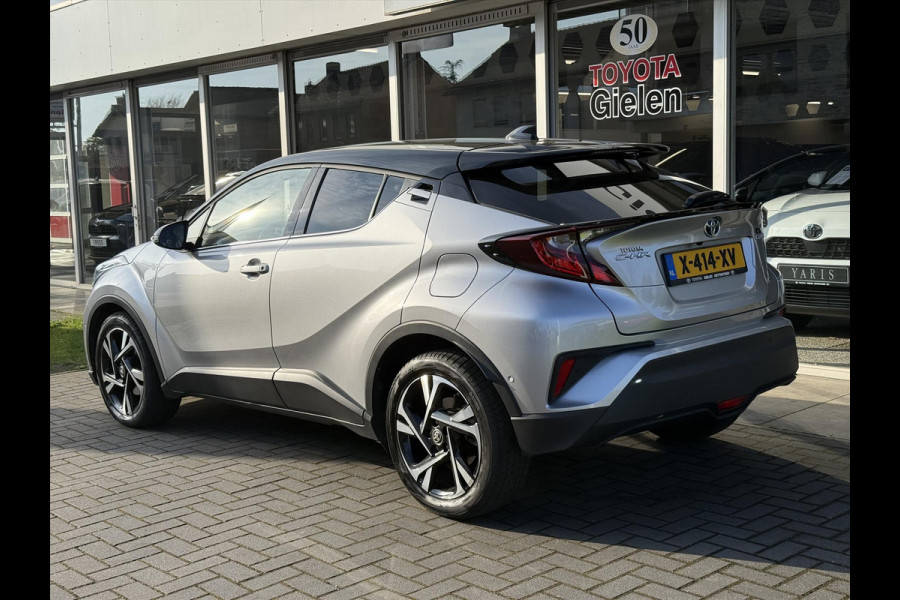 Toyota C-HR 1.8 Hybrid Bi-Tone | Dodehoekherkenning, Stoel + Stuurverwarming, Parkeersensoren, 18 inch, Keyless, Nieuwe multimedia