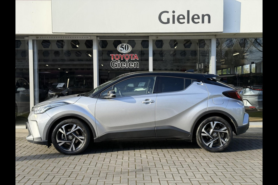 Toyota C-HR 1.8 Hybrid Bi-Tone | Dodehoekherkenning, Stoel + Stuurverwarming, Parkeersensoren, 18 inch, Keyless, Nieuwe multimedia