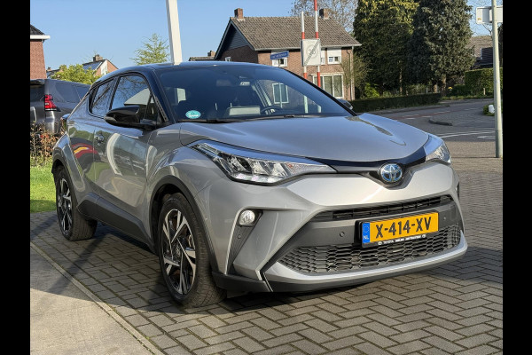 Toyota C-HR 1.8 Hybrid Bi-Tone | Dodehoekherkenning, Stoel + Stuurverwarming, Parkeersensoren, 18 inch, Keyless, Nieuwe multimedia