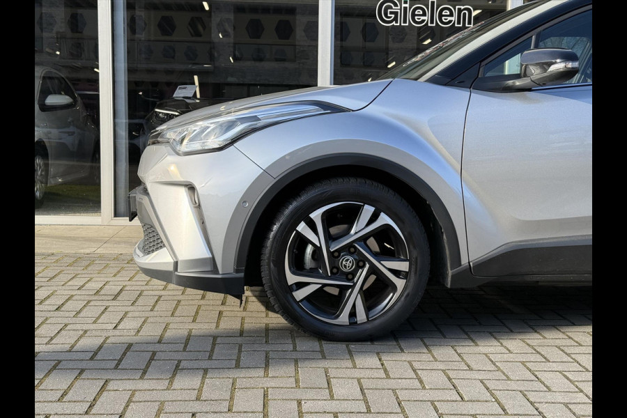 Toyota C-HR 1.8 Hybrid Bi-Tone | Dodehoekherkenning, Stoel + Stuurverwarming, Parkeersensoren, 18 inch, Keyless, Nieuwe multimedia