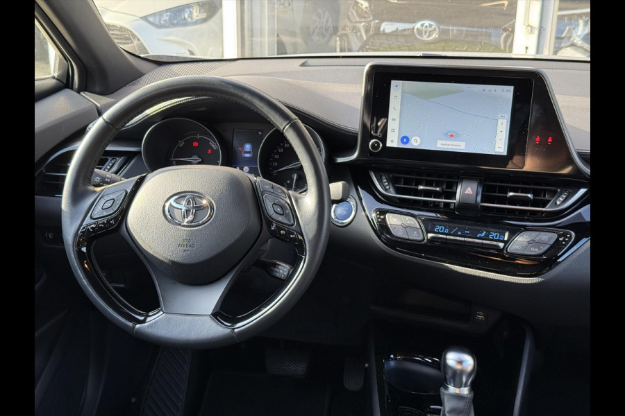 Toyota C-HR 1.8 Hybrid Bi-Tone | Dodehoekherkenning, Stoel + Stuurverwarming, Parkeersensoren, 18 inch, Keyless, Nieuwe multimedia