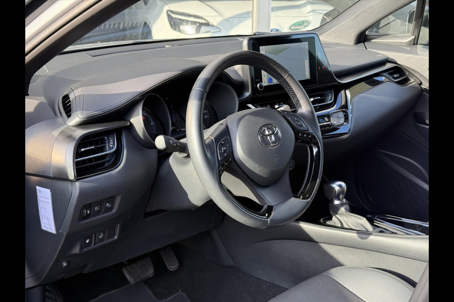 Toyota C-HR 1.8 Hybrid Bi-Tone | Dodehoekherkenning, Stoel + Stuurverwarming, Parkeersensoren, 18 inch, Keyless, Nieuwe multimedia