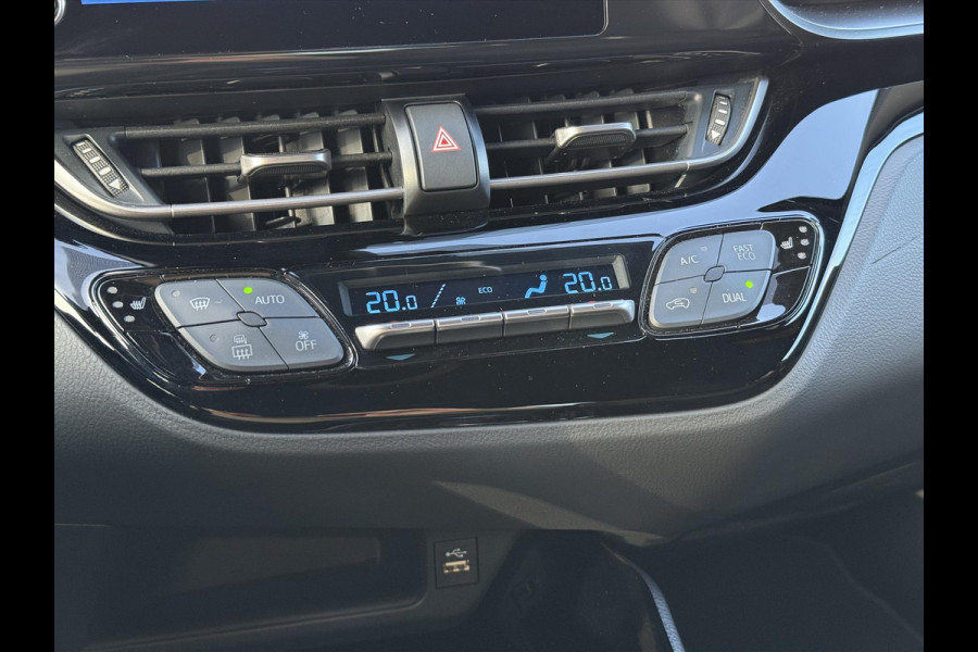 Toyota C-HR 1.8 Hybrid Bi-Tone | Dodehoekherkenning, Stoel + Stuurverwarming, Parkeersensoren, 18 inch, Keyless, Nieuwe multimedia