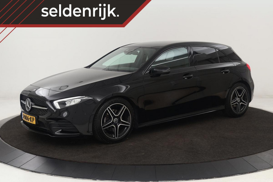 Mercedes-Benz A-Klasse 180 Business Solution AMG | Stoelverwarming | Carplay | Camera | Sfeerverlichting | Navigatie | Full LED | Leder/Alcantara | Widescreen