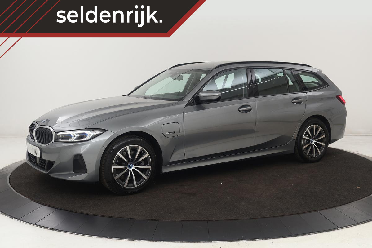 BMW 3-serie 320e Business | Stoelverwarming | Adaptive cruise | Trekhaak | Harman/Kardon | Carplay | Camera | Half leder | Sportstoelen BMW 3-serie 320e Business | Stoelverwarming | Adaptive cruise | Trekhaak | Harman/Kardon | Carplay | Camera | Half leder | Sportstoelen