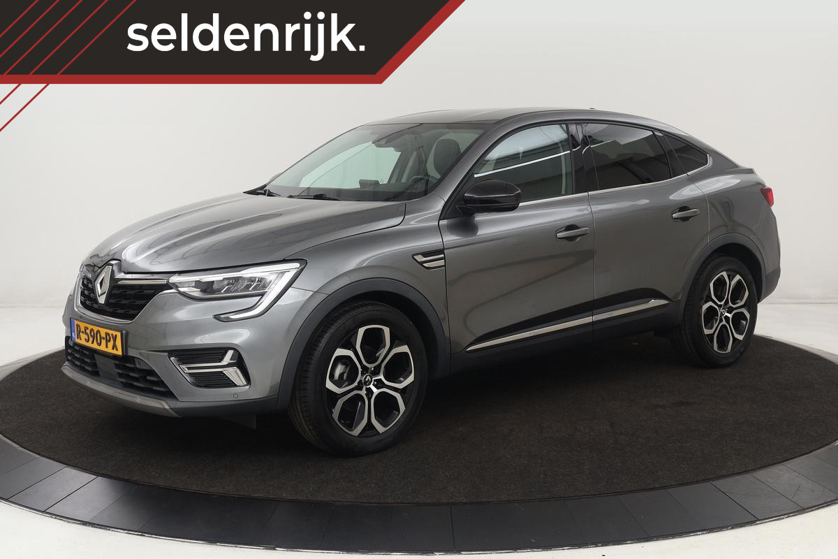 Renault Arkana 1.6 E-Tech Hybrid 145 Intens | Stoel & stuurverwarming | Adaptive cruise | Carplay | Camera | Keyless | Full LED | Navigatie Renault Arkana 1.6 E-Tech Hybrid 145 Intens | Stoel & stuurverwarming | Adaptive cruise | Carplay | Camera | Keyless | Full LED | Navigatie