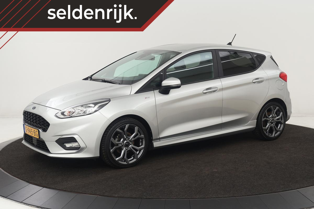 Ford Fiesta 1.0 EcoBoost ST-Line | Carplay | Climate control | PDC | Navigatie | Cruise control | Sportstoelen | DAB | Bluetooth Ford Fiesta 1.0 EcoBoost ST-Line | Carplay | Climate control | PDC | Navigatie | Cruise control | Sportstoelen | DAB | Bluetooth
