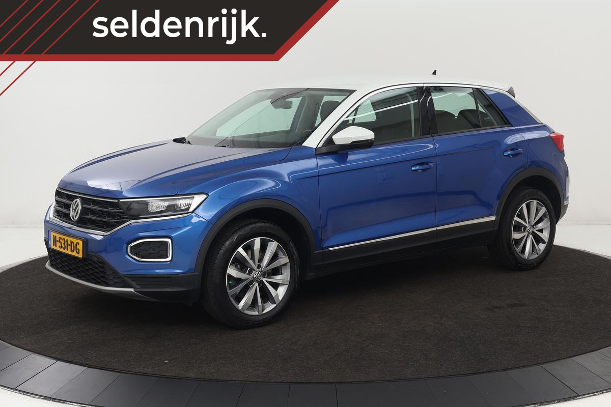 Volkswagen T-Roc 1.5 TSI Sport | Stoelverwarming | Full LED | Trekhaak | Navigatie | Climate control | PDC | Sportstoelen | Cruise control | Bluetooth Volkswagen T-Roc 1.5 TSI Sport | Stoelverwarming | Full LED | Trekhaak | Navigatie | Climate control | PDC | Sportstoelen | Cruise control | Bluetooth