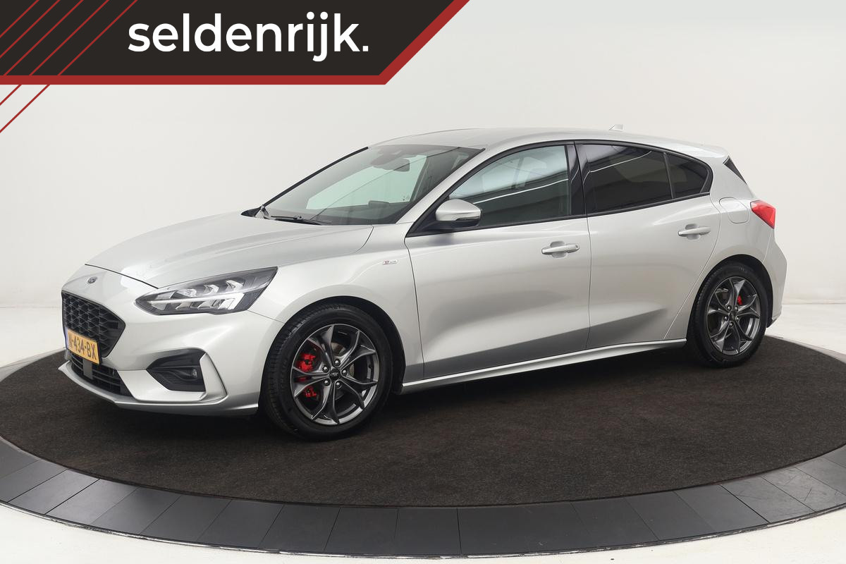 Ford Focus 1.0 EcoBoost ST Line X | Stoel & stuurverwarming | Trekhaak | Adaptive cruise | Full LED | Carplay | Navigatie | Keyless Ford Focus 1.0 EcoBoost ST Line X | Stoel & stuurverwarming | Trekhaak | Adaptive cruise | Full LED | Carplay | Navigatie | Keyless