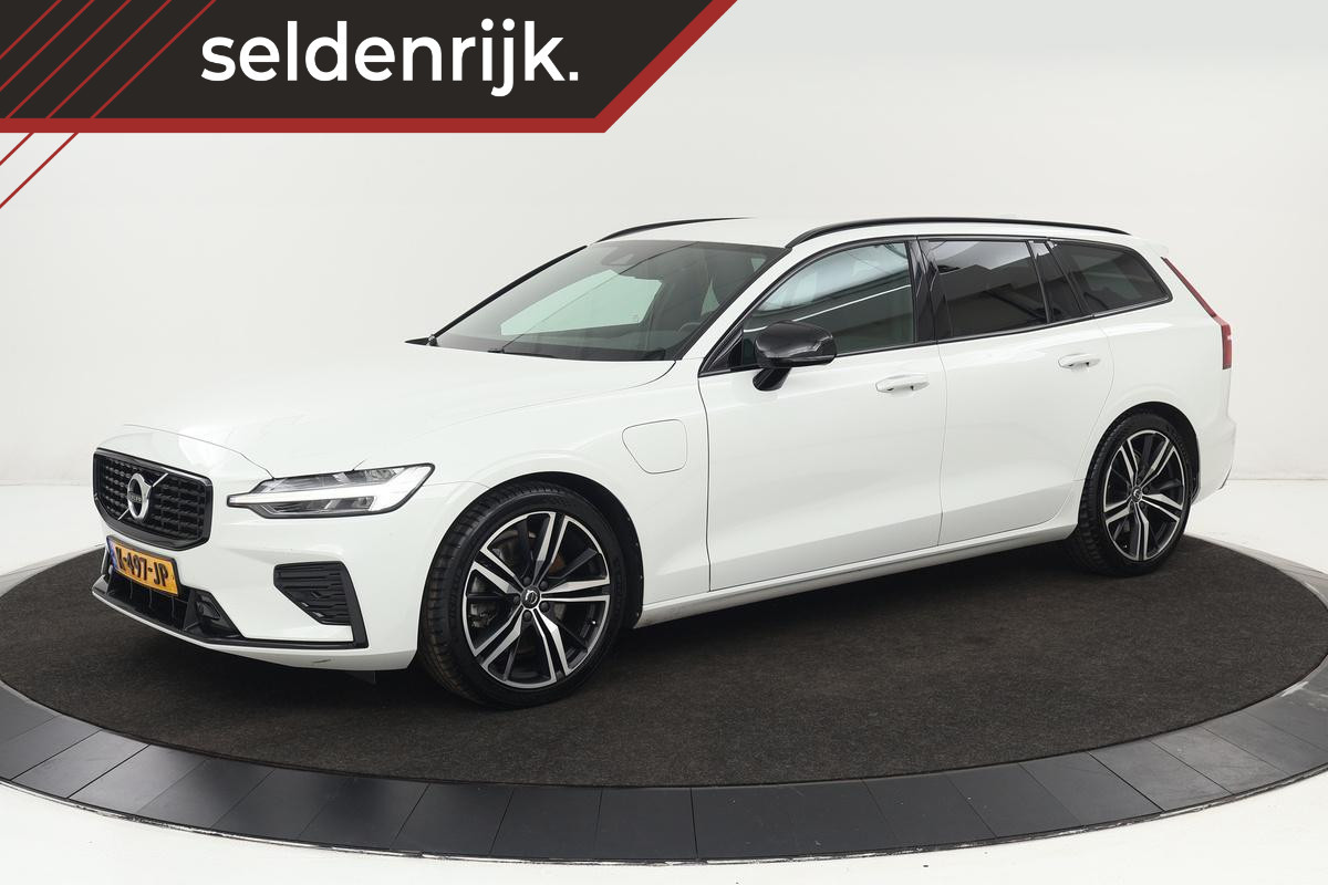 Volvo V60 2.0 T6 Recharge AWD R-Design | Trekhaak | Stoel & stuurverwarming | Adaptive cruise | Carplay | Camera | Keyless | Navigatie | Full LED | Dodehoek detectie | Half leder Volvo V60 2.0 T6 Recharge AWD R-Design | Trekhaak | Stoel & stuurverwarming | Adaptive cruise | Carplay | Camera | Keyless | Navigatie | Full LED | Dodehoek detectie | Half leder