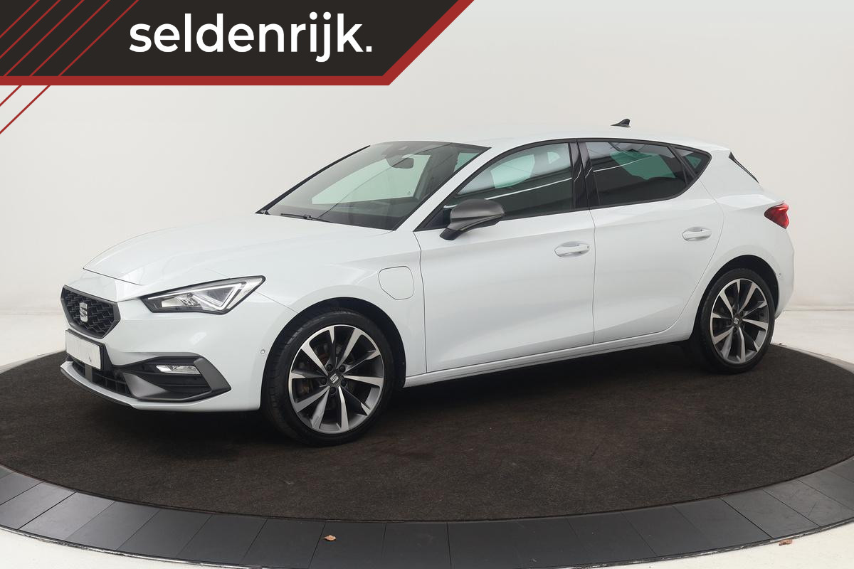 Seat Leon 1.4 TSI eHybrid PHEV FR | Stoelverwarming | Adaptive cruise | Camera | Carplay | Sfeerverlichting | Leder/Alcantara | Memory | Navigatie | Keyless | Full LED Seat Leon 1.4 TSI eHybrid PHEV FR | Stoelverwarming | Adaptive cruise | Camera | Carplay | Sfeerverlichting | Leder/Alcantara | Memory | Navigatie | Keyless | Full LED