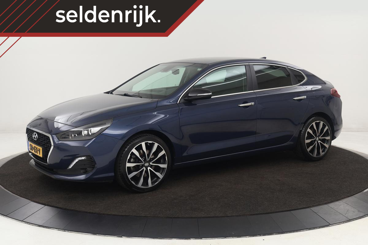 Hyundai i30 Fastback 1.4 T-GDI Premium | Trekhaak | Carplay | Full LED | Half leder | Keyless | Navigatie | Camera | Climate control | PDC | Cruise control Hyundai i30 Fastback 1.4 T-GDI Premium | Trekhaak | Carplay | Full LED | Half leder | Keyless | Navigatie | Camera | Climate control | PDC | Cruise control