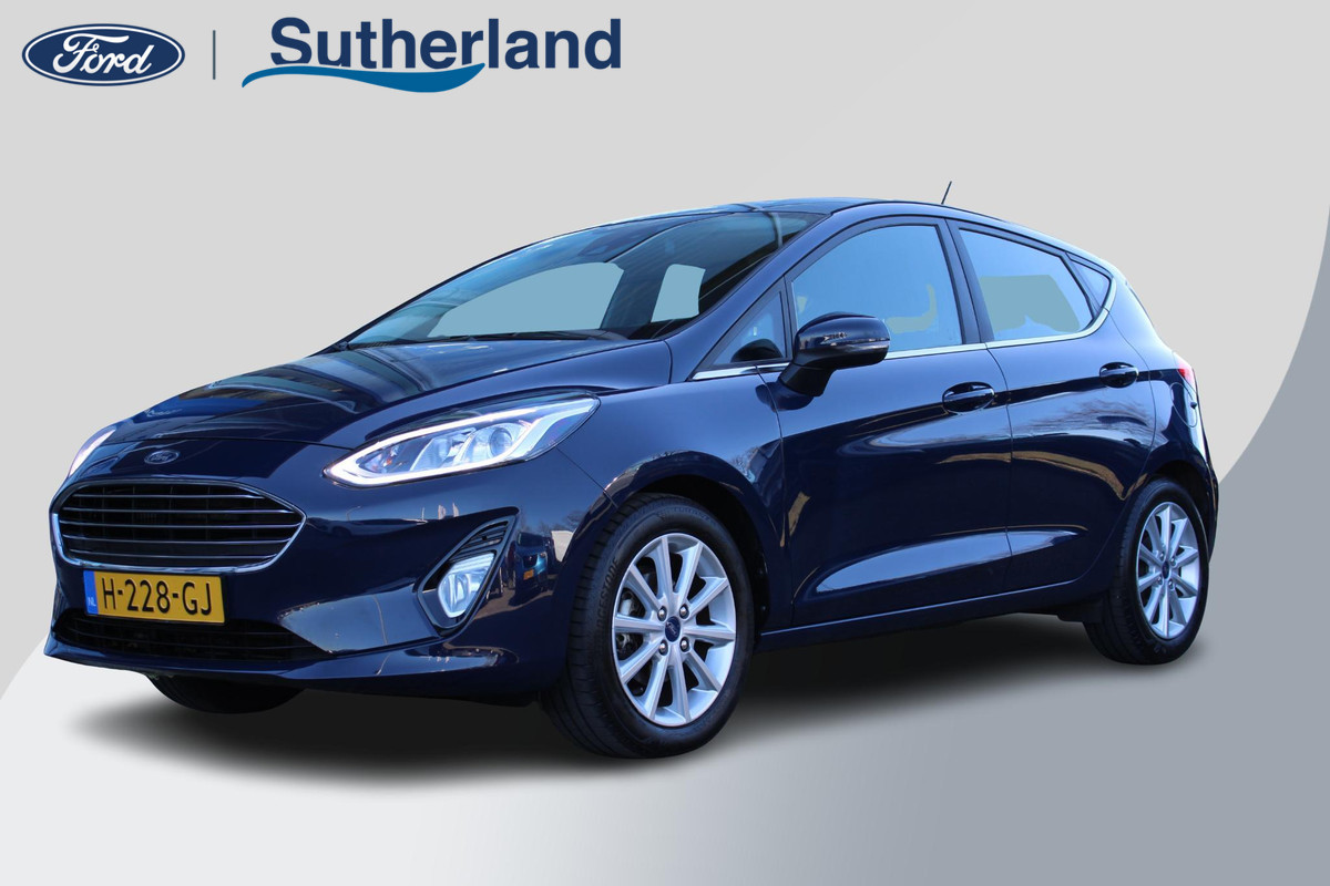 Ford Fiesta 1.0 EcoBoost Titanium | Cruise Control | Climate Control | Parkeersensoren | Lichtmetalen Velgen | Ford Fiesta 1.0 EcoBoost Titanium | Cruise Control | Climate Control | Parkeersensoren | Lichtmetalen Velgen |