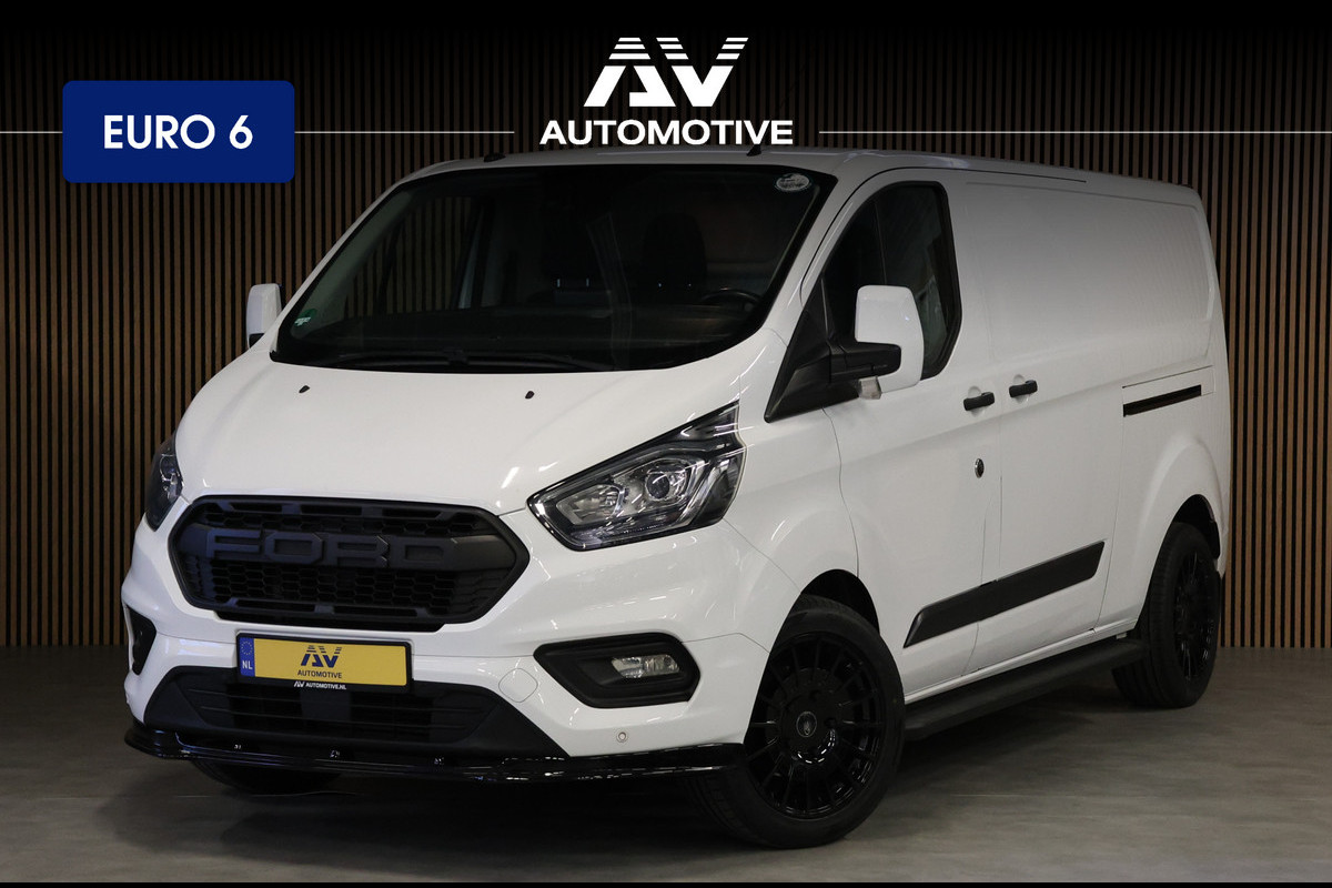Ford Transit Custom 340 2.0 TDCI L2H1 | L+R Schuifdeur | Navigatie | Blind Spot | CarPlay | Camera | Standkachel | Trekhaak | 3-Zitter | Nieuwe APK | Onderhoudsbeurt Ford Transit Custom 340 2.0 TDCI L2H1 | L+R Schuifdeur | Navigatie | Blind Spot | CarPlay | Camera | Standkachel | Trekhaak | 3-Zitter | Nieuwe APK | Onderhoudsbeurt