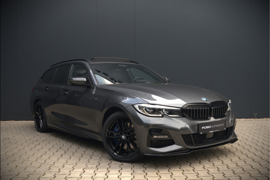 BMW 3 Serie Touring 330e xDrive High Executive M Sport | M Performance | Panoramadak | Harman Kardon | 360° Camera | Assisted Driving | Head Up Display | Stoelverwarming | Stuurverwarming | Apple Carplay | Navigatie | Adaptive Cruise Control | Am