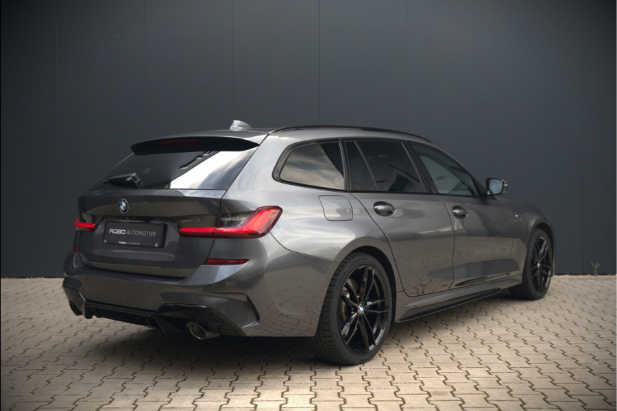 BMW 3 Serie Touring 330e xDrive High Executive M Sport | M Performance | Panoramadak | Harman Kardon | 360° Camera | Assisted Driving | Head Up Display | Stoelverwarming | Stuurverwarming | Apple Carplay | Navigatie | Adaptive Cruise Control | Am