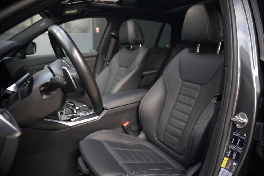 BMW 3 Serie Touring 330e xDrive High Executive M Sport | M Performance | Panoramadak | Harman Kardon | 360° Camera | Assisted Driving | Head Up Display | Stoelverwarming | Stuurverwarming | Apple Carplay | Navigatie | Adaptive Cruise Control | Am