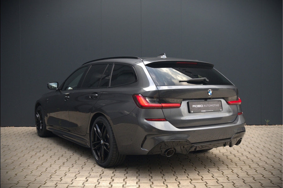 BMW 3 Serie Touring 330e xDrive High Executive M Sport | M Performance | Panoramadak | Harman Kardon | 360° Camera | Assisted Driving | Head Up Display | Stoelverwarming | Stuurverwarming | Apple Carplay | Navigatie | Adaptive Cruise Control | Am