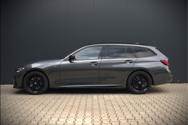 BMW 3 Serie Touring 330e xDrive High Executive M Sport | M Performance | Panoramadak | Harman Kardon | 360° Camera | Assisted Driving | Head Up Display | Stoelverwarming | Stuurverwarming | Apple Carplay | Navigatie | Adaptive Cruise Control | Am