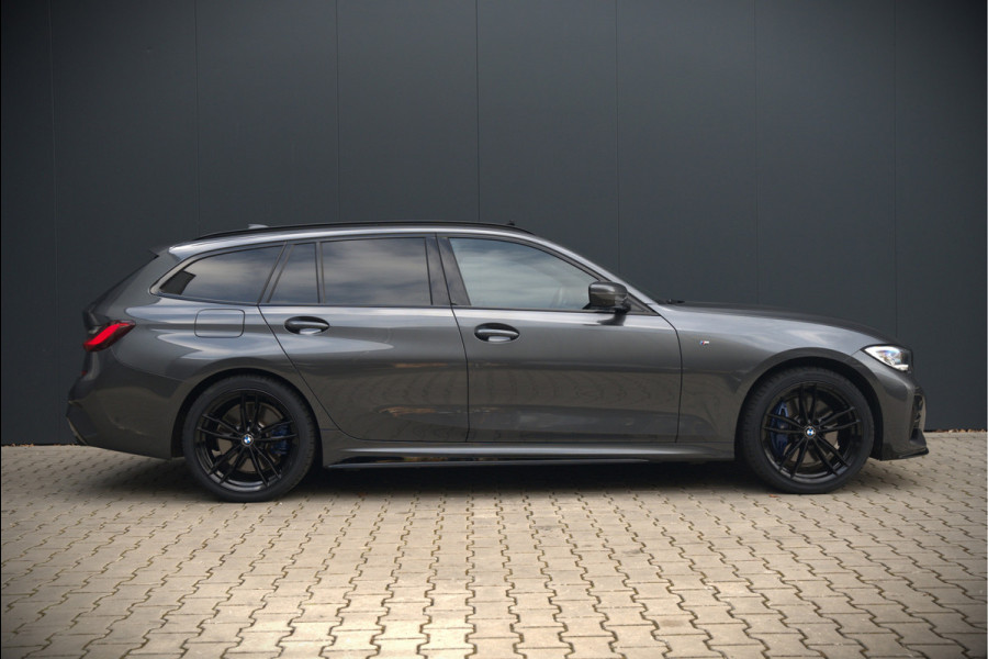 BMW 3 Serie Touring 330e xDrive High Executive M Sport | M Performance | Panoramadak | Harman Kardon | 360° Camera | Assisted Driving | Head Up Display | Stoelverwarming | Stuurverwarming | Apple Carplay | Navigatie | Adaptive Cruise Control | Am