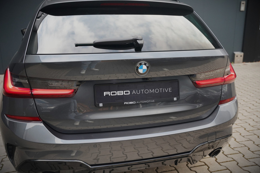 BMW 3 Serie Touring 330e xDrive High Executive M Sport | M Performance | Panoramadak | Harman Kardon | 360° Camera | Assisted Driving | Head Up Display | Stoelverwarming | Stuurverwarming | Apple Carplay | Navigatie | Adaptive Cruise Control | Am