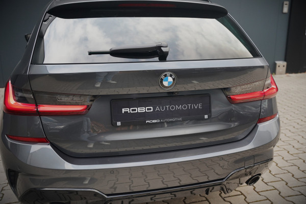 BMW 3 Serie Touring 330e xDrive High Executive M Sport | M Performance | Panoramadak | Harman Kardon | 360° Camera | Assisted Driving | Head Up Display | Stoelverwarming | Stuurverwarming | Apple Carplay | Navigatie | Adaptive Cruise Control | Am