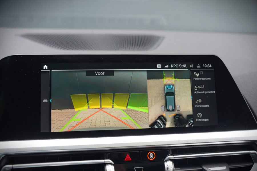 BMW 3 Serie Touring 330e xDrive High Executive M Sport | M Performance | Panoramadak | Harman Kardon | 360° Camera | Assisted Driving | Head Up Display | Stoelverwarming | Stuurverwarming | Apple Carplay | Navigatie | Adaptive Cruise Control | Am