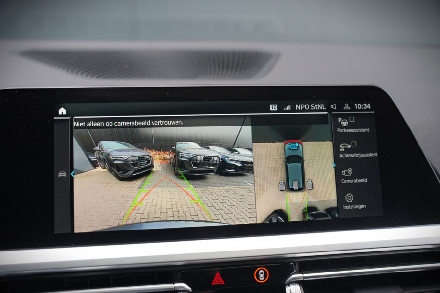 BMW 3 Serie Touring 330e xDrive High Executive M Sport | M Performance | Panoramadak | Harman Kardon | 360° Camera | Assisted Driving | Head Up Display | Stoelverwarming | Stuurverwarming | Apple Carplay | Navigatie | Adaptive Cruise Control | Am