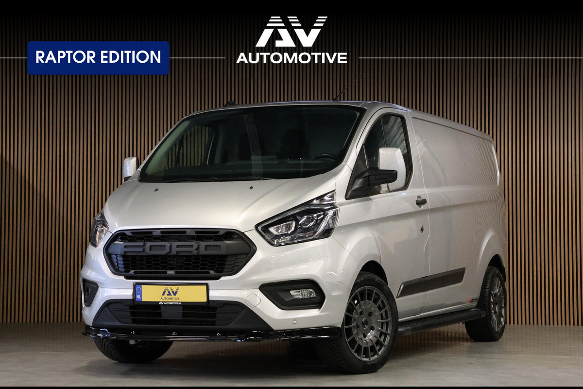 Ford Transit Custom 320 2.0 TDCI L2H1 Raptor Edition | Bi-Xenon | CarPlay | Navigatie | Camera | Stoelverwarming | Dodehoek detector | Lane Assist | DAB | Werkplaatsinrichting | 3-Zitter | Dealer onderhouden | Nieuwe APK Ford Transit Custom 320 2.0 TDCI L2H1 Raptor Edition | Bi-Xenon | CarPlay | Navigatie | Camera | Stoelverwarming | Dodehoek detector | Lane Assist | DAB | Werkplaatsinrichting | 3-Zitter | Dealer onderhouden | Nieuwe APK