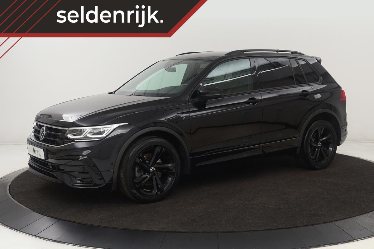 Volkswagen Tiguan 1.4 TSI eHybrid R Line | Leder | Trekhaak | Stoelverwarming | Camera | Adaptive cruise | Carplay | Matrix LED | Navigatie | Park Assist | Memory Volkswagen Tiguan 1.4 TSI eHybrid R Line | Leder | Trekhaak | Stoelverwarming | Camera | Adaptive cruise | Carplay | Matrix LED | Navigatie | Park Assist | Memory