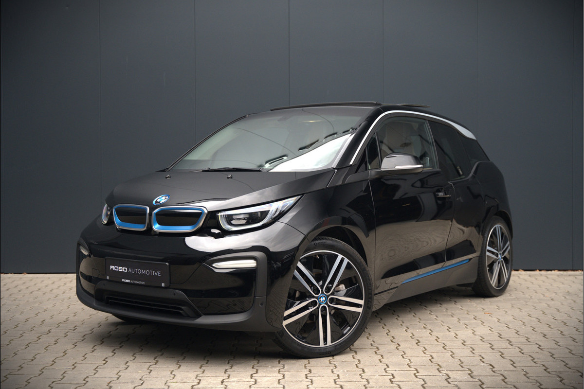 BMW i3 Executive Edition 120Ah 42 kWh | Panoramadak | Leer | Warmtepomp | Cruise Control | Navigatie | Keyless | Parkeersensoren | Stoelverwarming | Camera | Dealer Onderhouden | NAP | BTW BMW i3 Executive Edition 120Ah 42 kWh | Panoramadak | Leer | Warmtepomp | Cruise Control | Navigatie | Keyless | Parkeersensoren | Stoelverwarming | Camera | Dealer Onderhouden | NAP | BTW