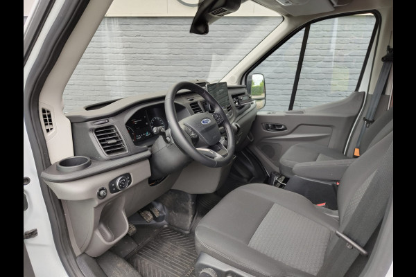 Ford Transit 350 D130pk L4H3 Navi Camera Pdc Apple Carplay Android WiFi-vb Airco Cruise Control Voorruit-Verwarmd 2.0TDCI Regensensor DAB Schuifdeur Betonplex Vloer Wandbetimmering Roll Stability Control Led Spoorwisselassist Euro 6 Zeer Compleet!
