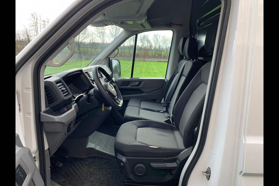 Volkswagen Crafter 2.0TDI L3H2 3p.Navigatie PDC-a+v Airco Cruise-Control Licht-Regensensor Dab+ Bluetooth Verwarmbare voorruit+ruitensproeiers Betonplex Lat-om-Lat Betimmering Schuifdeur 1e Eigenaar Euro 6 2.500KG trekvermogen