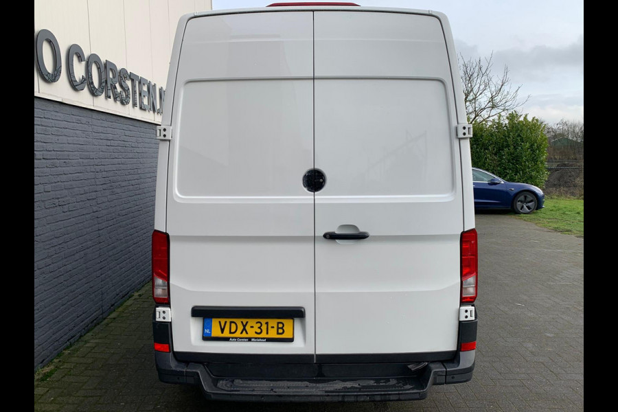 Volkswagen Crafter 2.0TDI L3H2 3p.Navigatie PDC-a+v Airco Cruise-Control Licht-Regensensor Dab+ Bluetooth Verwarmbare voorruit+ruitensproeiers Betonplex Lat-om-Lat Betimmering Schuifdeur 1e Eigenaar Euro 6 2.500KG trekvermogen