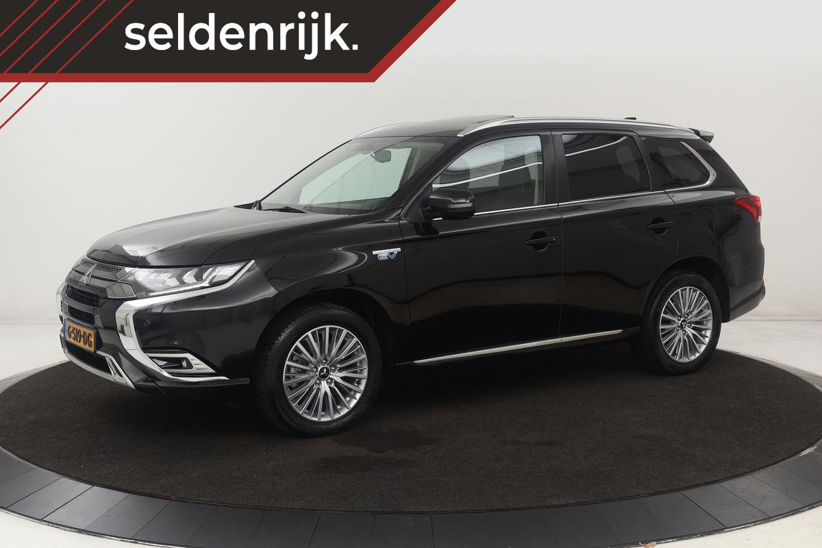 Mitsubishi Outlander 2.4 PHEV Intense+ | Schuifdak | Trekhaak | Stoelverwarming | Carplay | Camera | Full LED | Stuurverwarming | Keyless | Dodehoek detectie | Half leder Mitsubishi Outlander 2.4 PHEV Intense+ | Schuifdak | Trekhaak | Stoelverwarming | Carplay | Camera | Full LED | Stuurverwarming | Keyless | Dodehoek detectie | Half leder