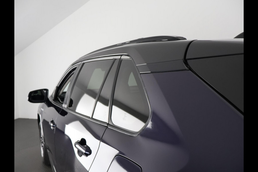 Toyota RAV4 2.5 HYBRID 4WD BUSINESS BLEULINE BI-TONE AWD. NAVI.CARPLAY.PDC.1650 KG TREKGEWICHT. GARANTIE TOT 2030!