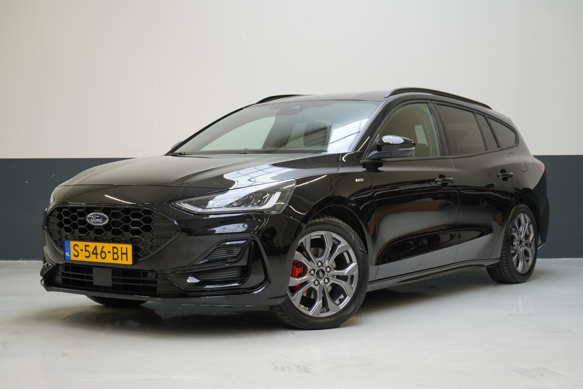 Ford Focus Wagon 1.0 EcoBoost 155pk Hybrid ST Line | Trekhaak | Navigatie | Achteruitrijcamera | All-seasonbanden Ford Focus Wagon 1.0 EcoBoost 155pk Hybrid ST Line | Trekhaak | Navigatie | Achteruitrijcamera | All-seasonbanden